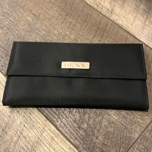 DKNY silver logo snap flap black satin finish leather interior wallet.